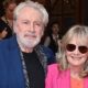 Twiggy, 74, looks sensational in a hot pink suit as she cosies up to her husband Leigh Lawson at Hello, Dolly! press night